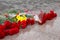 Bouquets of flowers lie on granite in the Victory Memorial during the celebration of Victory Day.