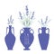 Bouquets of lavender in three types of ancient Mediterranean style vases.