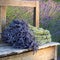 Bouquets on lavenders on a old bench