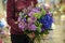 Bouquey of gree, purple and blue flowers