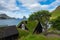 Bour village. Typical grass-roof houses and green mountains. Vagar island, Faroe Islands. Denmark. Europe