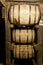 Bourbon barrels aging in a distillery warehouse