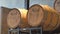 Bourbon barrels on a rack in a distillery