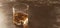 Bourbon in glass, american corn whiskey, dark bar counter, selective focus