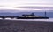 Bournemouth Pier, UK, photographed from the beach, in low light early in the morning.