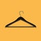 Boutique shop black clothes hanger on yellow background