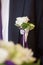 Boutonniere on trendy groom at wedding