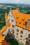 Bouzov,Czech Republic-July 8, 2021.Aerial view of romantic fairytale castle with eight-storey watchtower built in 14th century.