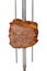 Bovine rump meat steak, traditional brazilian barbecue whole piece on skewer,