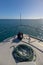 Bow of a boat with while sailing in the ocean with nautical mooring rope. clear background