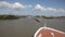 Bow of cruise ship sailing towards Miraflores lock, on the Panama Canal, Central America