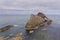 Bow-fidle Rock landscape on the coast of Scotland on cloudy afternoon