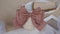 Bow hair with tails in beautiful brown color made out of cotton fabric