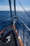 A bow pulpit, a yacht getting close to the Green Island in Great Coral Barrier, Cairns, Australia