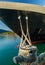 Bow, rat guards and mooring lines of cruise ship tied to dock bollard,, Alaska.