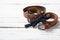 Bow tie and belt on a wooden background. Happy dad`s day.