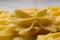 Bow tie pasta Close up. Farfalle pasta. Farfalle bows italian pasta. Farfalle - bow shaped pasta