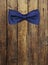 Bow tie on wooden textur
