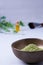 A bowl of the ayurvedic powder Sidr Zizyphus jujuba on a light background