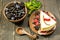 A bowl of berries and a cheesecake. Multicolored berries. Flat lay. Hot mood.