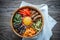 Bowl of bibimbap on the wooden table