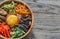 Bowl of bibimbap on the wooden table