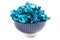 A Bowl of Blue Wrapped Candy on a White Background