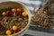 Bowl of cereal bran stick with golden berries and raspberries