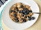 Bowl of cereal with fresh blueberries for a nutritional breakfast