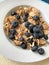 Bowl of cereal with fresh blueberries for a nutritional breakfast