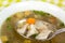 A Bowl of chicken soup with selective focus