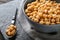 Bowl with chickpeas on table