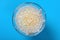 Bowl of Chinese syrup of sago on blue background