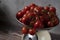 a bowl of cocktail tomatoes is weighed