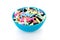 Bowl with colorful laces rods candy