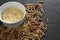 Bowl of corn bran with cereal bran stick spread