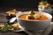 A bowl of creamy tomato soup garnished with croutons and fresh basil. (Generative AI)