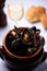 A bowl of delicious moules mariniere for lunch in a seafood rest