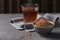 Bowl of fenugreek seeds and Egyptian fenugreek yellow tea or Methi Dana drink