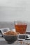 Bowl of fenugreek seeds and Egyptian fenugreek yellow tea or Methi Dana drink