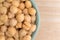 Bowl filled with organic garbanzo beans on table