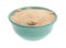 Bowl filled with stone ground whole wheat muffin mix.