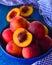 Bowl of fresh fruits sliced and whole