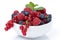 Bowl with fresh juicy berries, close-up, isolated