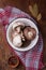 Bowl of fresh raw champignon mushrooms on red kitchen towel, pepper set, bay leaves. Autumn harvest, seasonal jrganic vegan food,