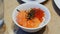 Bowl with Fresh Salmon, Red Caviar Grains and Rice. Japanese Style Healthy Food