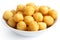 Bowl of fried small potato balls.