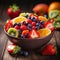 bowl of fruit and strawberries and kiwis arranged on wooden table