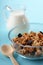 Bowl full of musli with milk, healthy breakfast