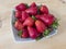 Bowl full of red strawberries